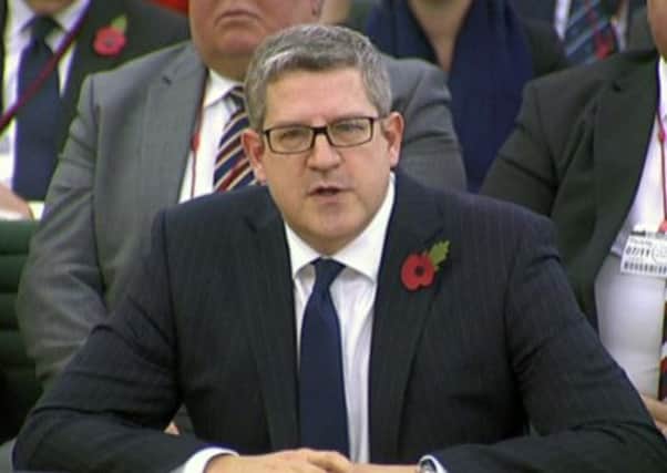 Andrew Parker as Britain's intelligence agencies give televised testimony for the first time in public today. Picture: AP