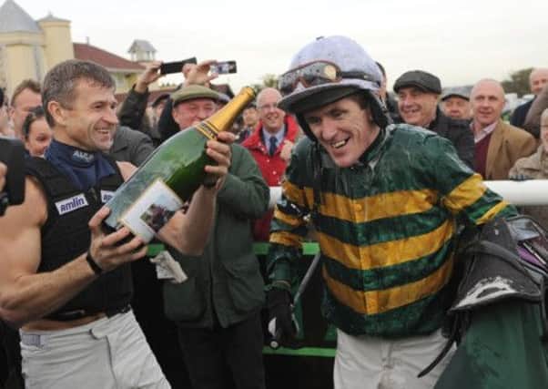 AP McCoy soaks up the adulation at Towcester yesterday and now has his sights on trainer Martin Pipes record of 4,182 winners. Picture: Getty