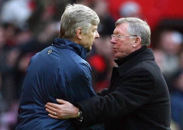Long-time rivals Arsene Wenger and Sir Alex Ferguson will no longer meet up in the technical areas. Picture: AFP/Getty