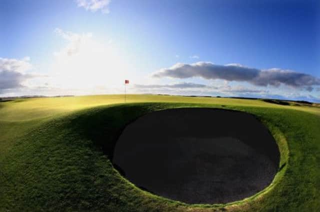 A hole lot different: The 11th green on the Old Course, which has seen dramatic change. Picture: Getty