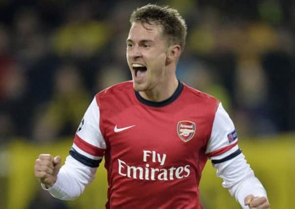 Aaron Ramsey celebrates a goal during the Champions League match between Borussia Dortmund and Arsenal. Picture: AP