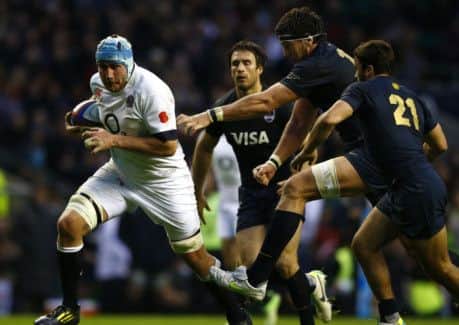 Sweet relief: England replacement back-rower Ben Morgan runs in the fourth and final try to put a gloss on the victory. Picture: Reuters