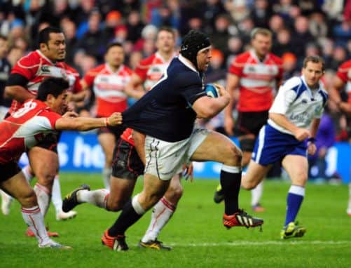 Scotlands Alasdair Dickinson scores his countrys fourth try against Japan at Murrayfield. Picture: Ian Rutherford