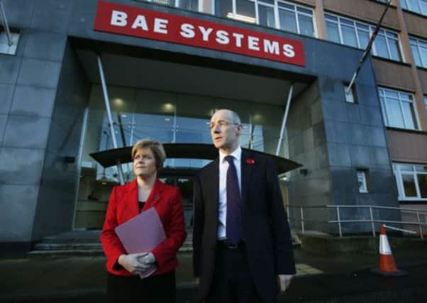 Nicola Sturgeon and Finance Secretary John Swinney arrive at BAE Systems Scotstoun shipyard. Picture: PA