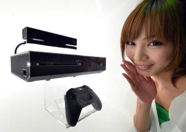 Microsoft's Xbox One will vie with Sony's PS4 to put a console in every home. Picture: Getty