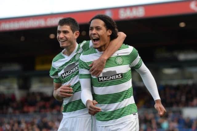 Virgil van Dijk, right, is congratulated by Nir Biton after heading his and Celtics second goal on Saturday. Picture: SNS