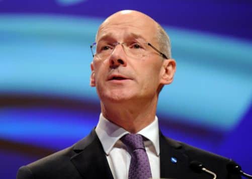 Finance Secretary John Swinney said the economic recovery was gaining ground. Picture: Jane Barlow