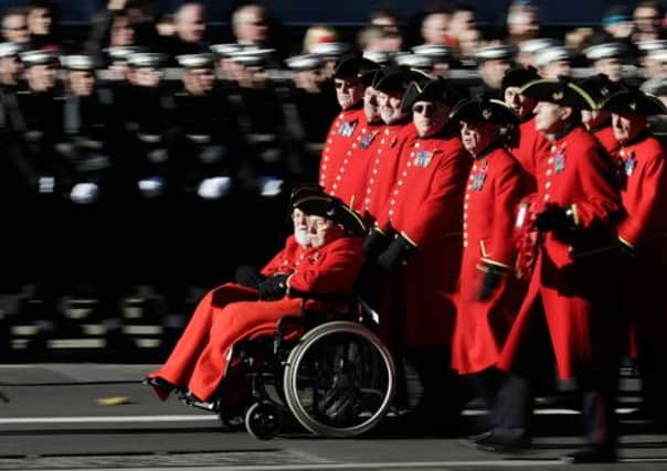 Veterans make their way past the Cenotaph on Whitehall yesterday. Picture: Getty