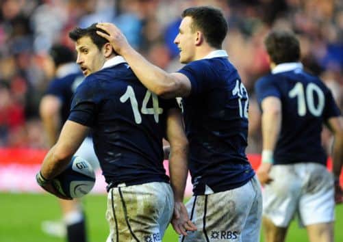 Matt Scott congratulates try scorer Tommy Seymour after his second try. Picture: Ian Rutherford