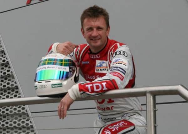 Allan McNish celebrated championship success in Shanghai yesterday. Picture: Contributed