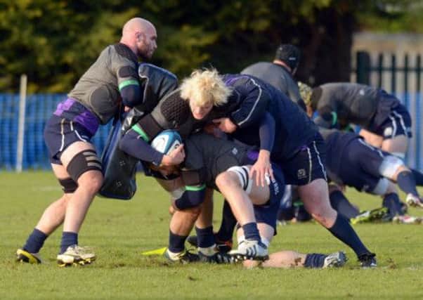 Richie Gray, centre, in the thick of the action at Scotlands training session yesterday. Picture: Phil Wilkinson