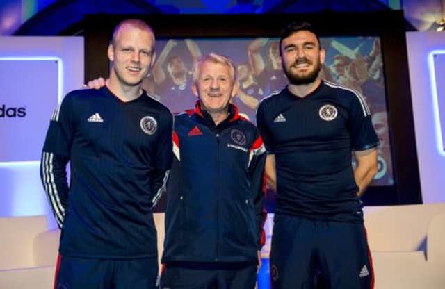 Steven Naismith, Gordon Strachan and Robert Snodgrass model the new Scotland kit by Adidas. Picture: SNS