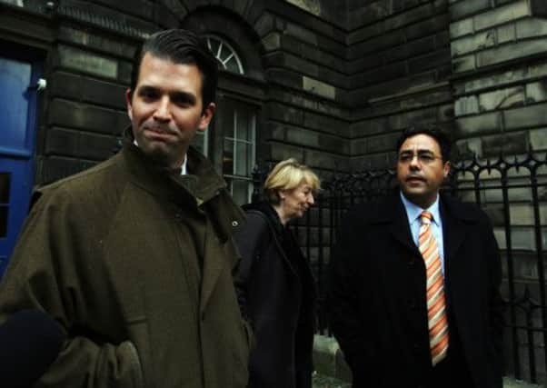 Donald Trump Jr departs the Court of Session in Edinburgh along with George Sorial. Picture: PA