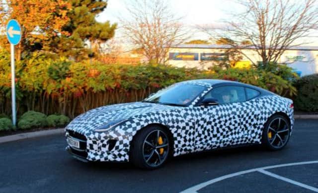 The Jaguar F-Type coupe was spotted in a supermarket car park. Picture: HeMedia