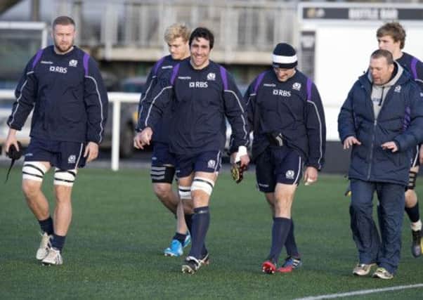 Kelly Brown is all smiles as Scotland arrive for training. Picture: SNS