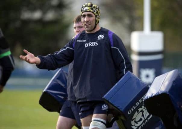 Scotland captain Kelly Brown will play no part in Sunday's game. Picture: SNS