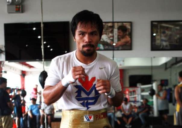 Manny Pacquiao poses during a training session in General Santos in the Philippines ahead of his comeback. Picture: Getty