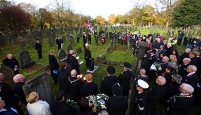 A memorial service for PC James Gordon at St Helens Cemetery, who was murdered whilst on duty in 1893. Picture: PA