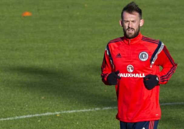 Striker Steven Fletcher trained at Cappielow yesterday and is set to start for Scotland tonight. Picture: SNS