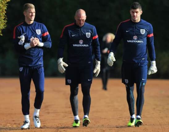 Either Celtics Fraser Forster, far right, or Norwichs John Ruddy, centre, will play ahead of Joe Hart, left, for England tonight. Picture: PA