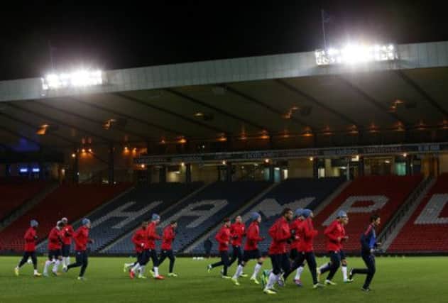 The United States players are taken through their paces at Hampden Park last night. Picture: AP