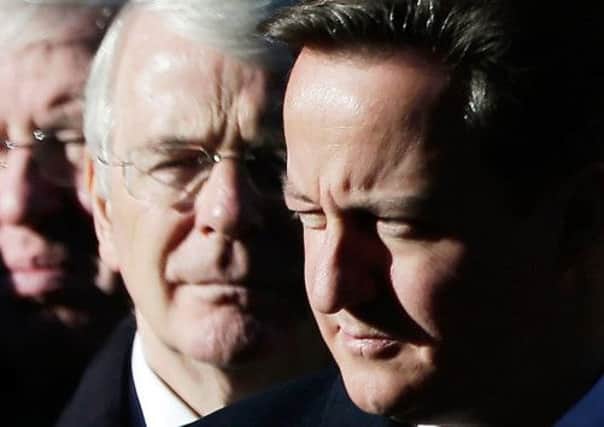 Former Prime Minister Sir John Major and current Prime Minister David Cameron. Picture: Getty