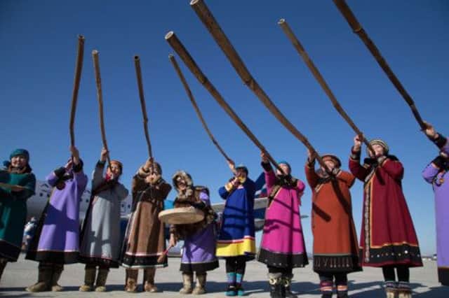Nivkh musicians play at a welcome ceremony for the Olympic torch on the Russian island of Sakhalin this week. Picture: AFP