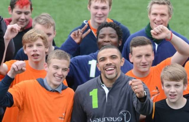 Bryan Habana led a group of team-mates on a visit to The Spartans Community Football Academy in Edinburgh yesterday. Picture: Neil Hanna