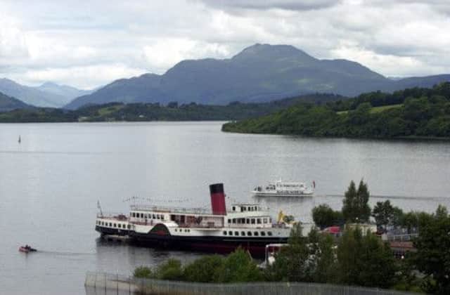 Tranquil now: Loch Lomond and the Maid of the Loch with Ben Lomond in the background. Picture: Allan Milligan