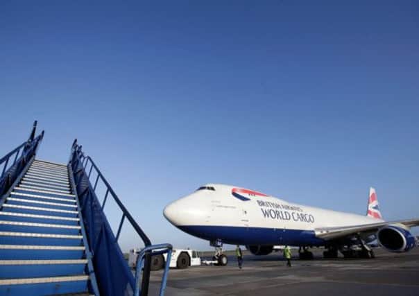 A British Airways freight aircraft prepares to take off yesterday with relief supplies for the Philippines. Picture: Getty