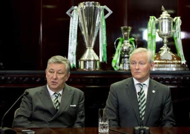 Celtic chief executive Peter Lawwell, left, and chairman Ian Bankier may be happy to have the focus on a poor joke rather than on pay issues. Picture: SNS