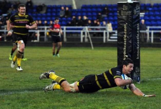 Melrose's Peter Eccles goes over for the try which killed off Hawks' hopes at Old Anniesland. Picture: Robert Perry