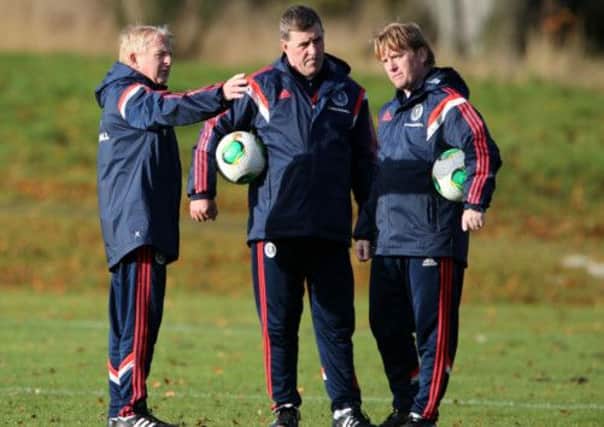 Scotland manager Gordon Strachan with assistants Mark McGhee and Stuart McCall. Strachan praised the drive of the team in training. Picture: PA