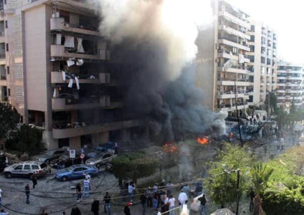 The scene of total devastation yesterday after a double bomb attack outside the Iranian embassy in Beirut. Picture: Getty