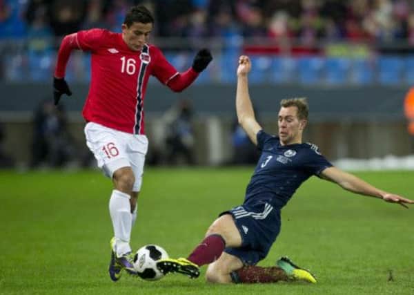 Norway's Omar Elabdellaoui vies for the ball with Scotland's Steven Whittaker. Picture: Getty