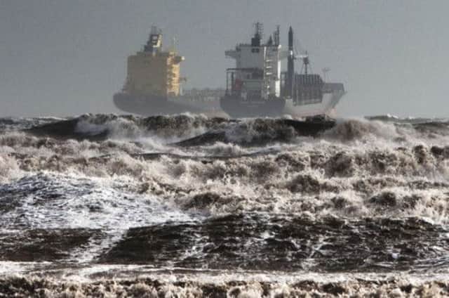 Two tankers are battered by gale winds while at the roadstead in the rough waters of the Gulf of Cagliari, Sardinia. Picture: AP