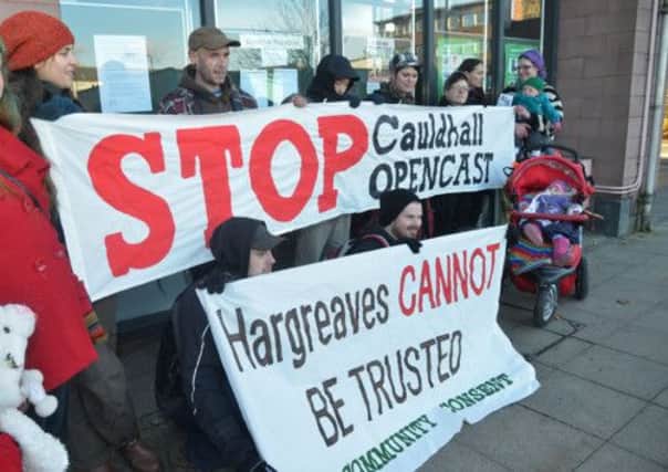 Campaigners gather outside Midlothian Council to protest against opencast coal plans. Picture: John Savage