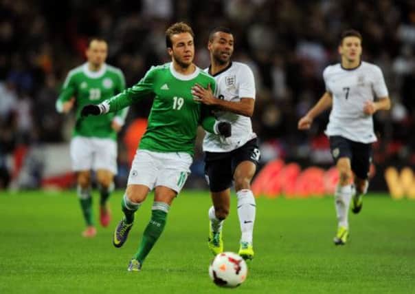 Mario Goetze battles with Ashley Cole. Picture: Getty