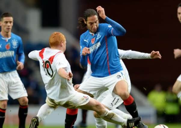 Bilel Mohsni has been compared to former Rangers defender Madjid Bougherra by team-mate Lee McCulloch. Picture: SNS