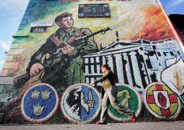 An Irish Republic Army (IRA) mural on a wall in west Belfast, Northern Ireland, pictured in 2006. Picture: AP