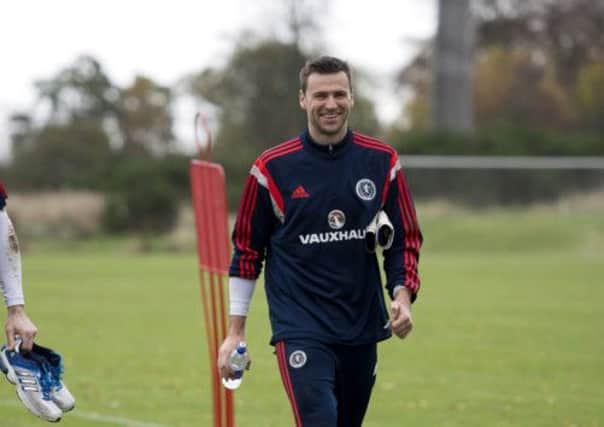 David Marshall is all smiles in training. Picture: SNS