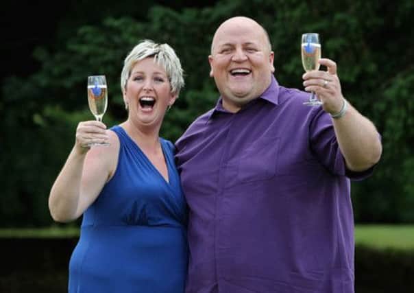 Adrian Bayford, 41, and wife Gillian, 40 won the jackpot in 2012. Picture: PA