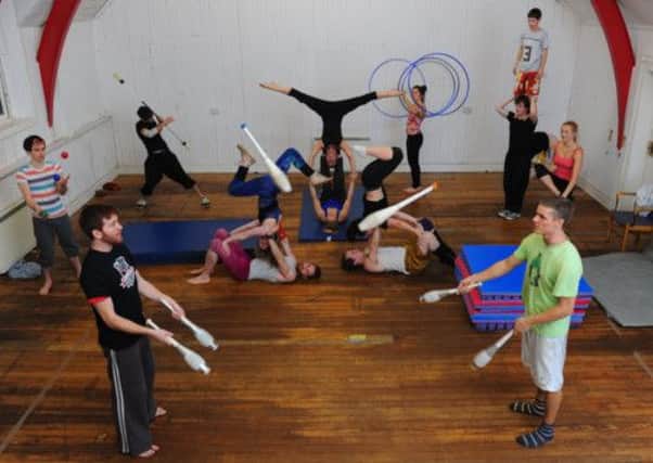 Performers at the Commonwealth Circus and Parkour School warm up and train for the 2014 Games. Picture: Robert Perry