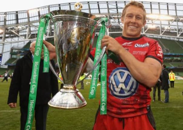 Jonny Wilkinson, the Toulon captain, holds the Heineken Cup after victory over ASM Clermont Auvergne. Picture: Getty