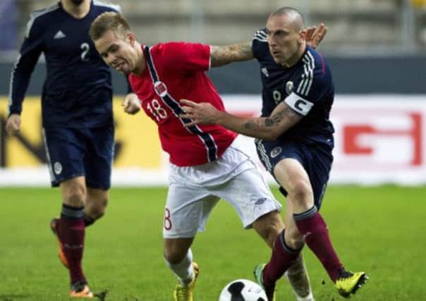 Scott Brown: Criticised for kicking out at opponent during Norway friendly. Picture: AP