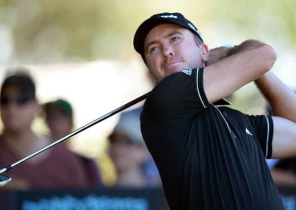 Martin Laird tees off during the Golf World Cup tournament at the Royal Melbourne course in Australia. Picture: Getty