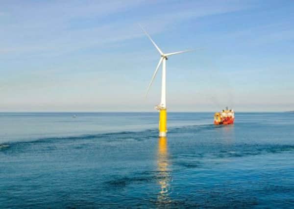 A Hywind deep-water floating turbine being towed to a location off the coast of Norway. Picture: Øyvind Hagen/Statoil ASA