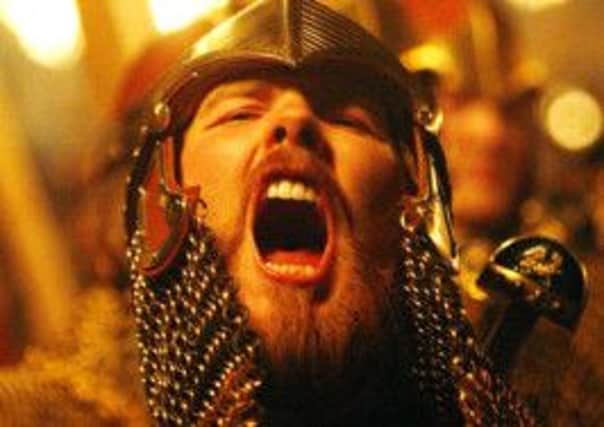 A red-haired 'Viking' at Up Helly Aa. Picture: Getty