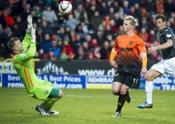 Dundee Utd winger Gary Mackay-Steven sees his close range effort saved, but helped himself to two goals against Partick Thistle. Picture; SNS