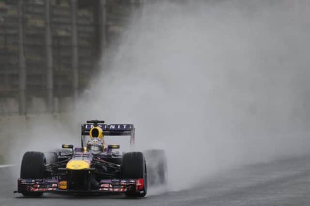 Spray away: Sebastian Vettel adapted better than most. Photograph: AP